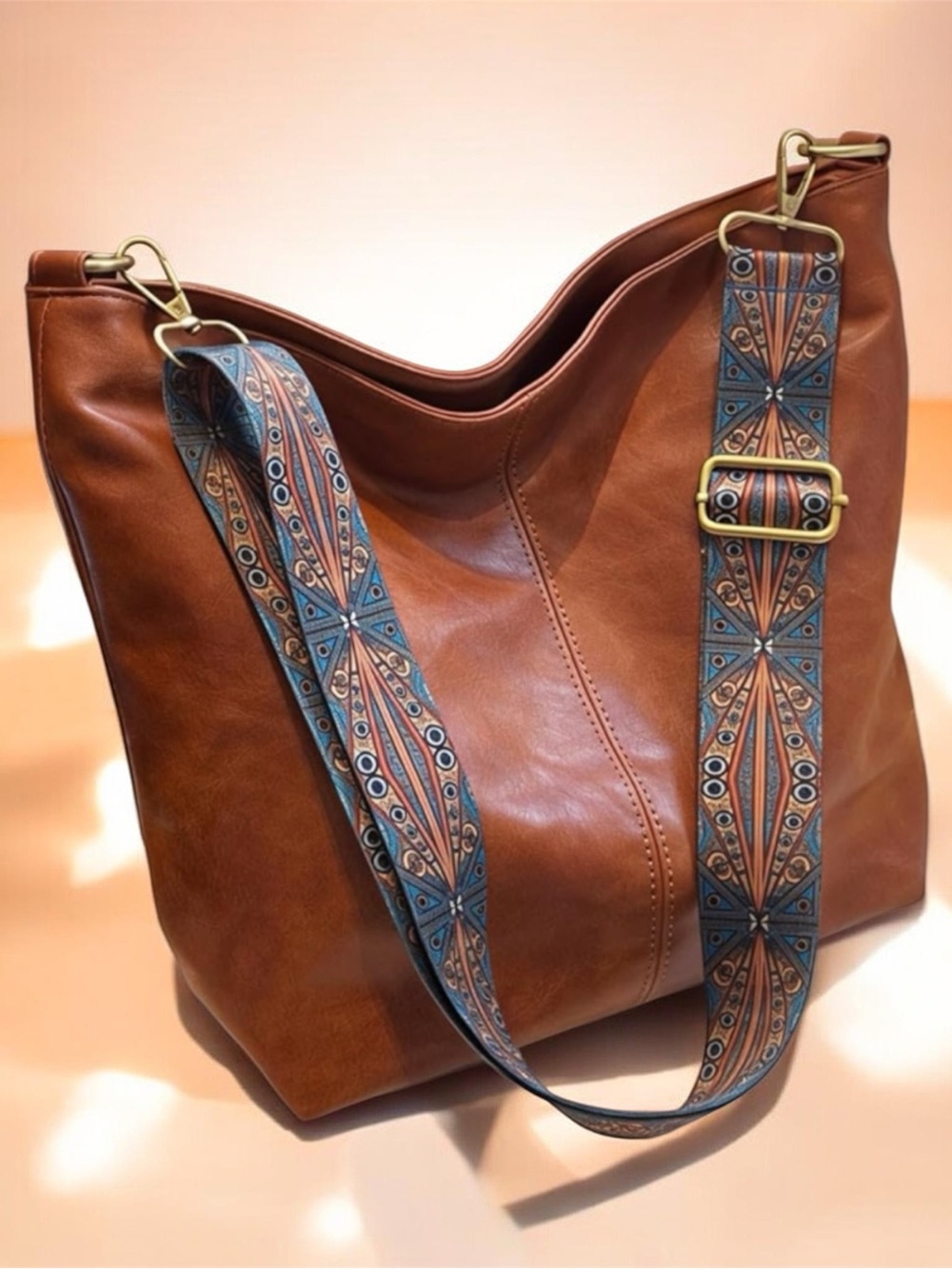 Tan Hobo with Patterned Blue-Brown Strap Hobo Crossbody